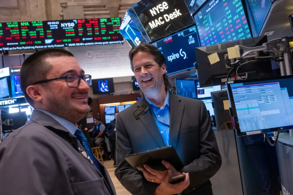Two men on trading floor